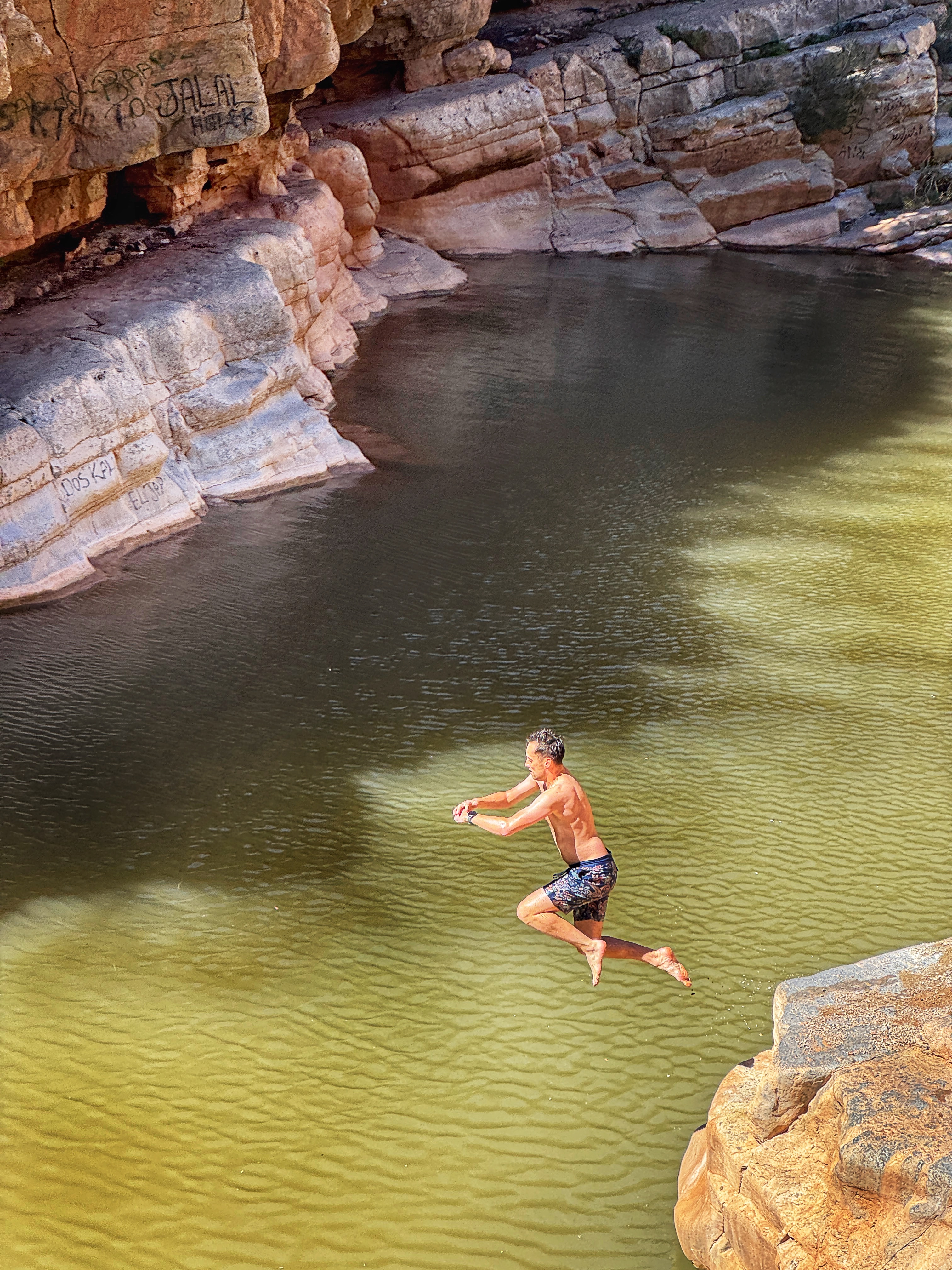 Me jumping into a natural pool in Paradise Valley